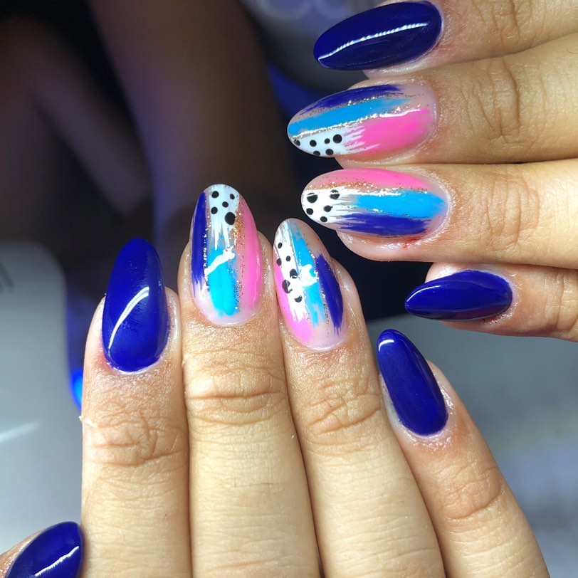 Nails split by deep purple and white halves