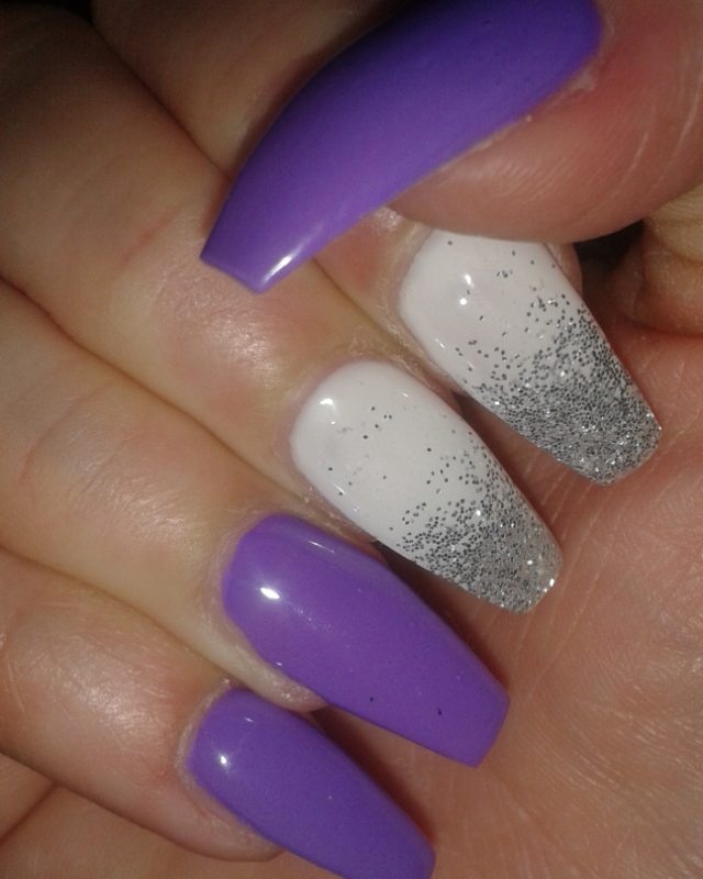 Purple nails with glittering crystal dots
