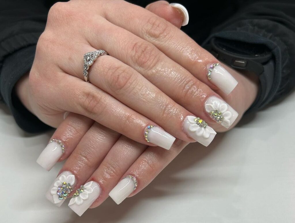 Short white nails with 3D flowers