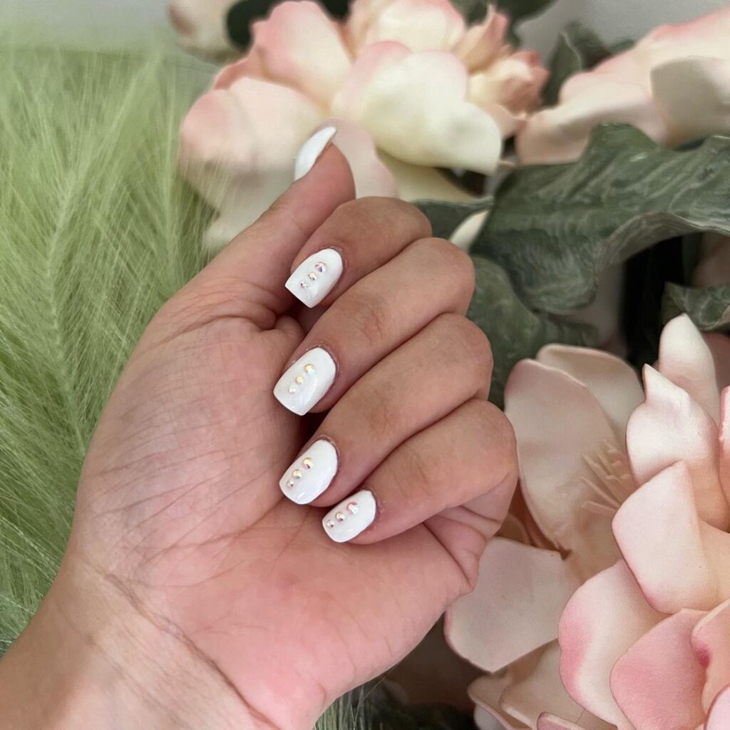 Short glossy white acrylic nails