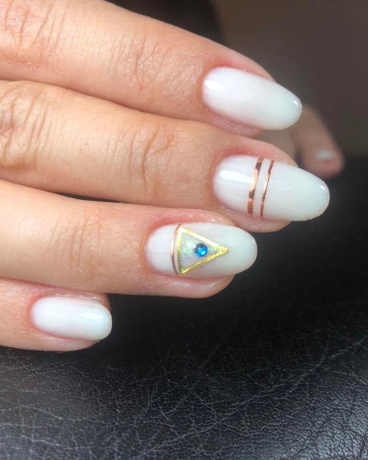 Short white nails with mirror-like shine