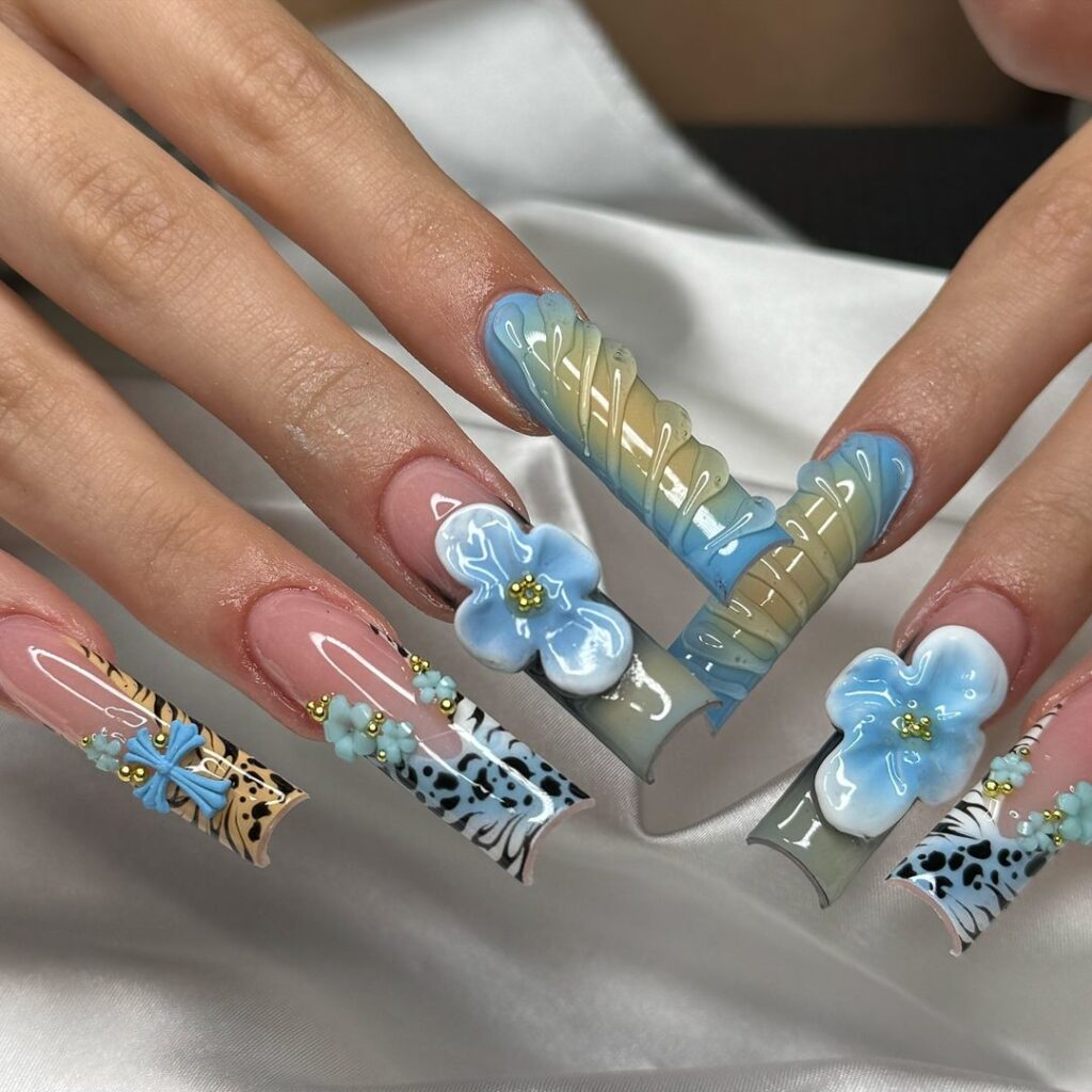 Square nails with pastel floral designs