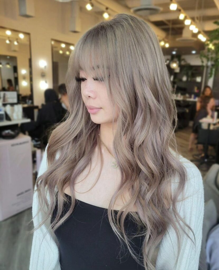 Wavy layered hair with casual bangs