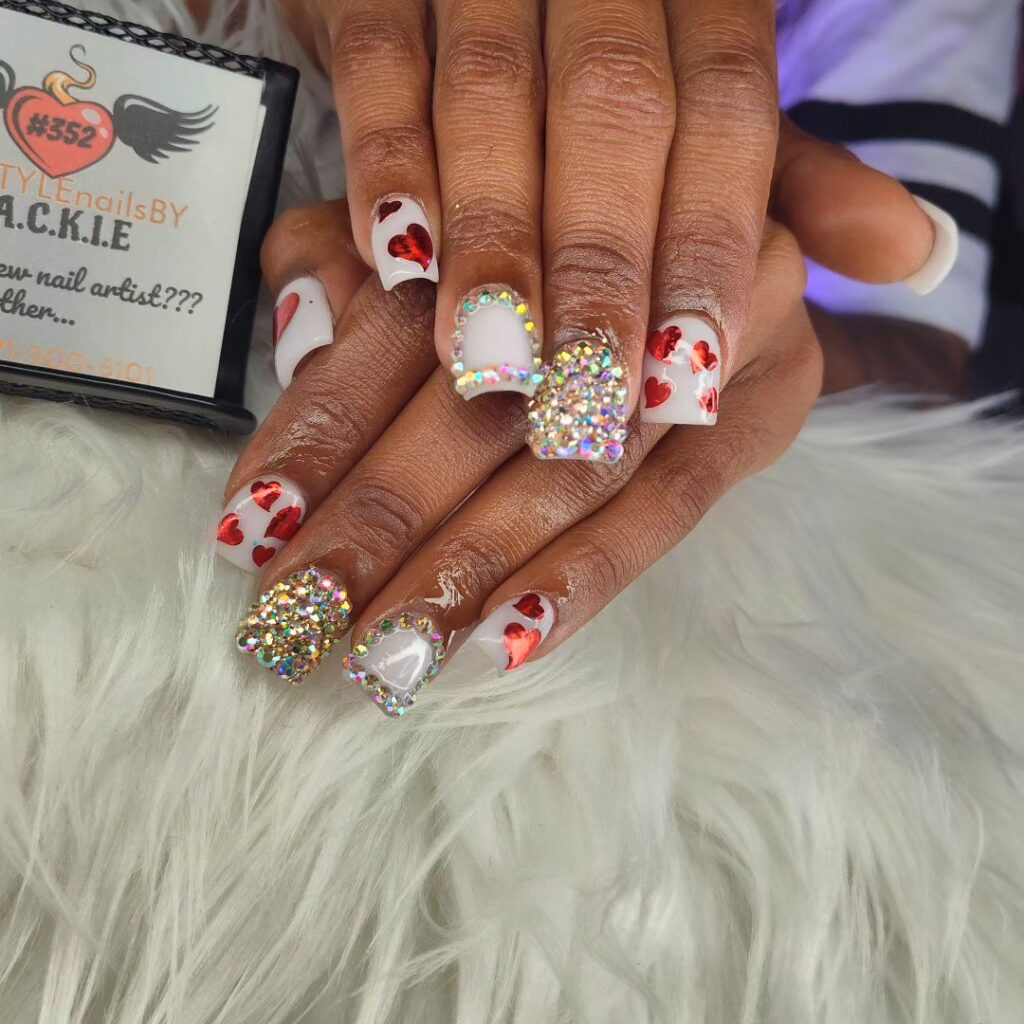 White nails with birthday party designs