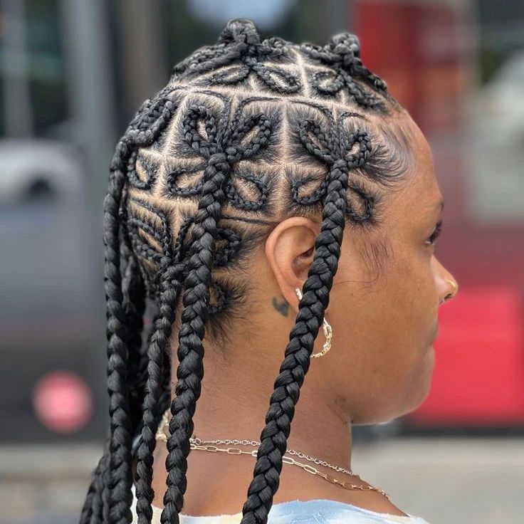 Box braids arranged in butterfly shape