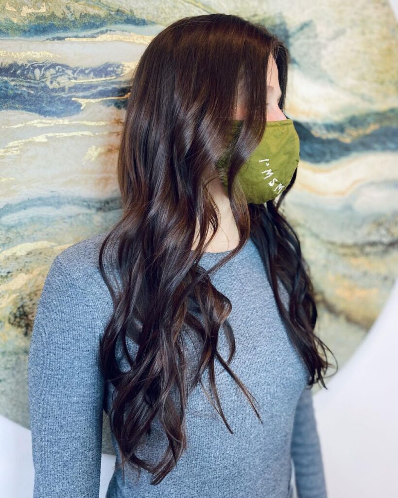 Dark hair with golden-brown highlights