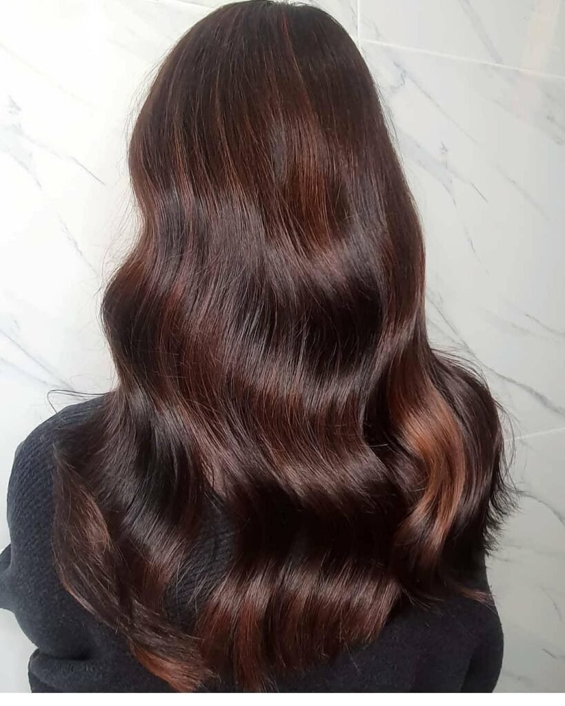 Dark brown hair with spicy undertones