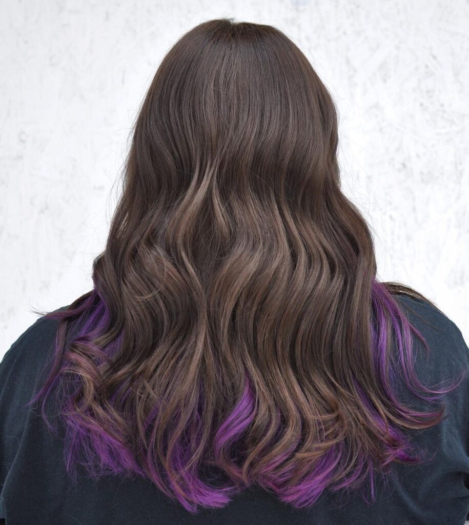 Brown hair with purple streaks