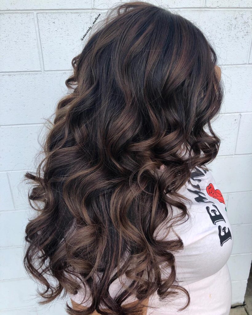 Deep brown hair with red tones