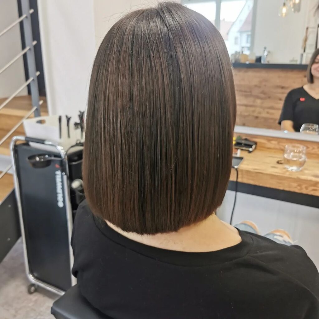 Short bob in dark reddish-brown color