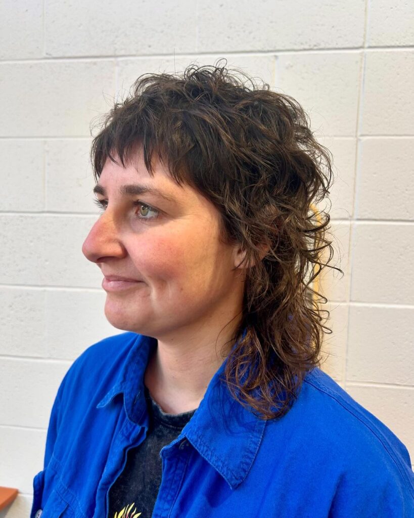 Mature woman with tousled choppy shag