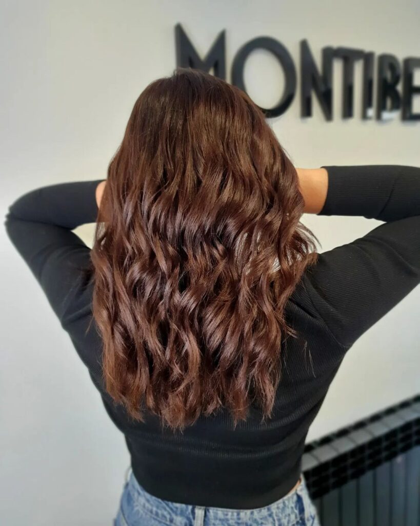 Brown hair with bright copper streaks