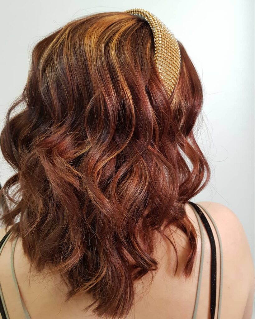 Curly dark brown hair with shine