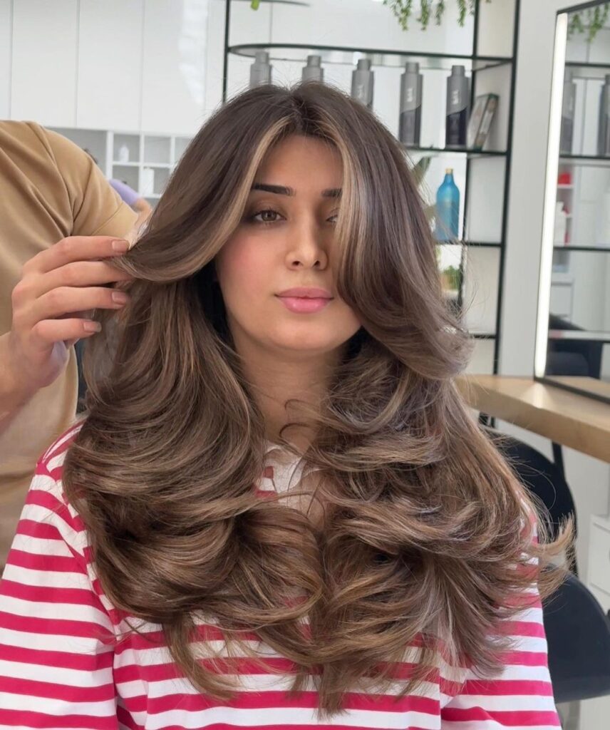Shoulder-length hair with flipped-out ends