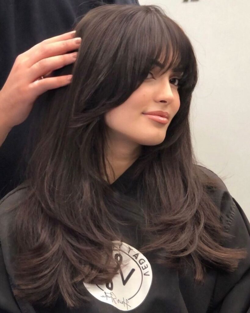 Hair with shorter layers in front