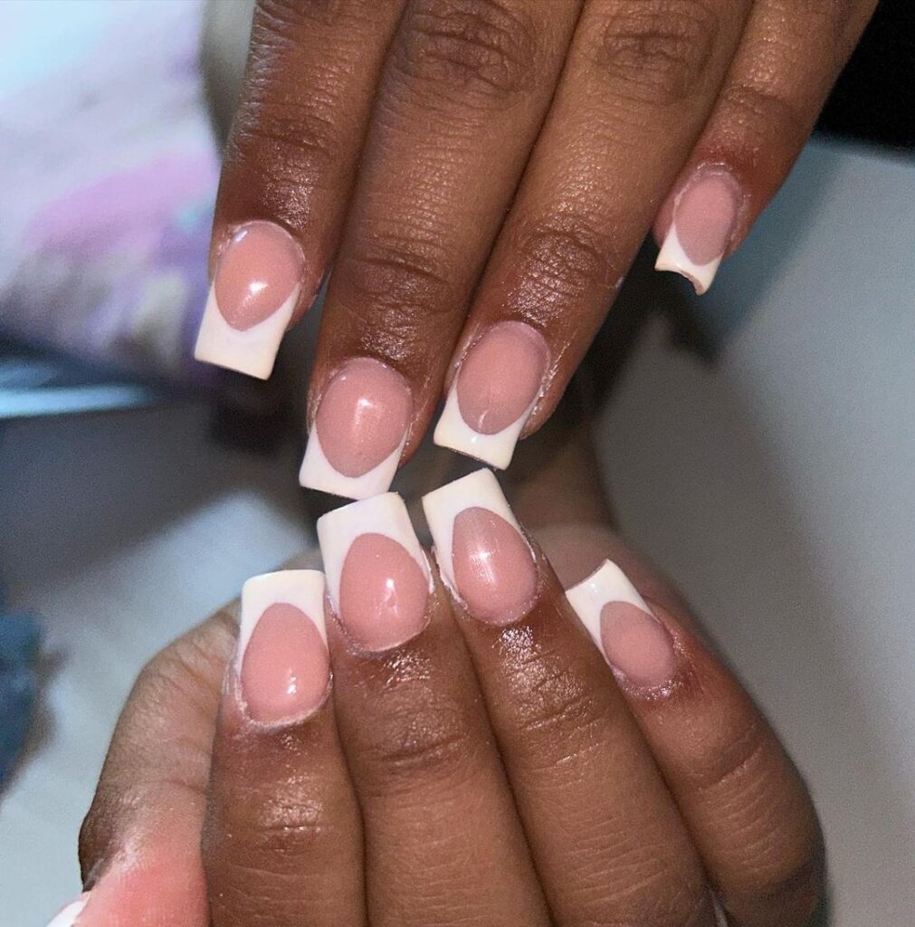 Short nails, pink base, white tips