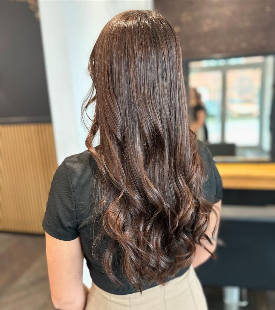 Light brown, soft curls, bouncy texture