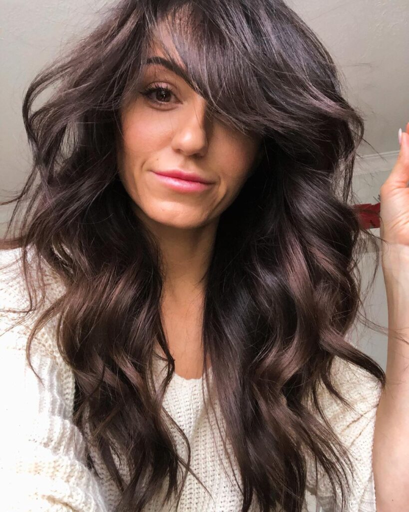 Medium brown, defined curls, coffee-like shade