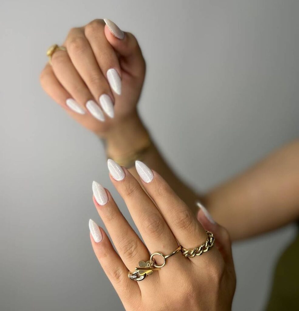 White nails, mountain peak tips, modern