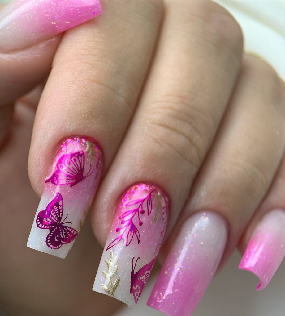 Pink square nails with orchard designs