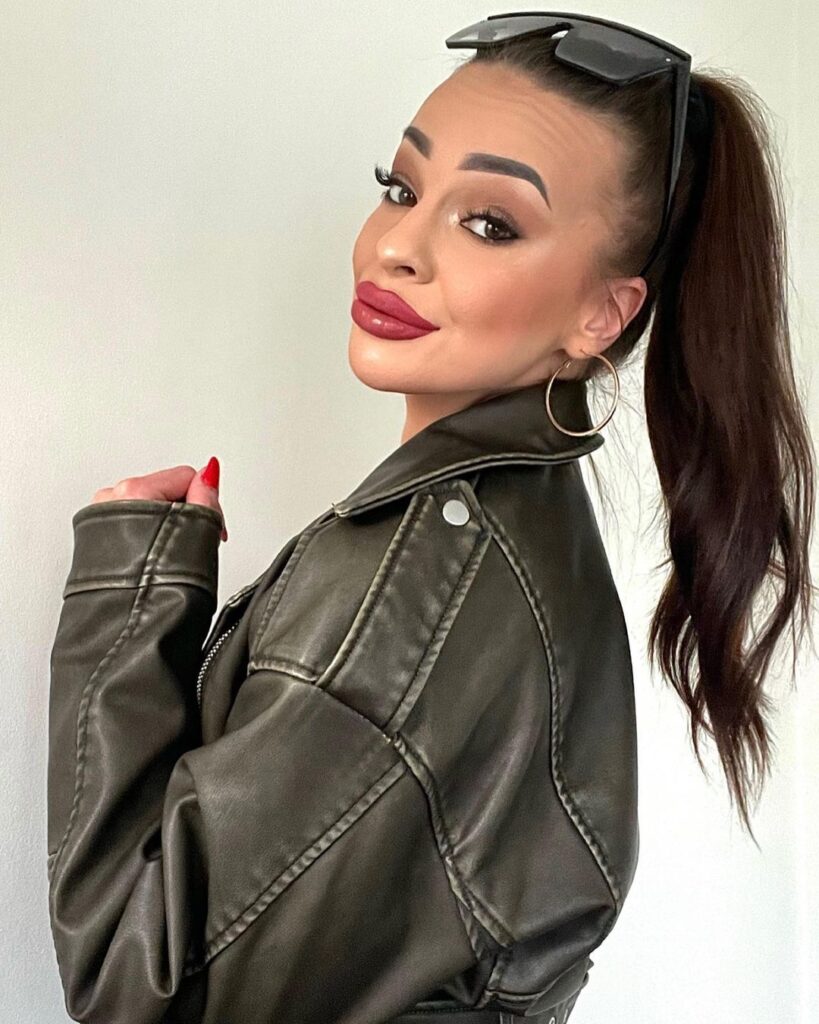Brown hair, high ponytail, sleek style