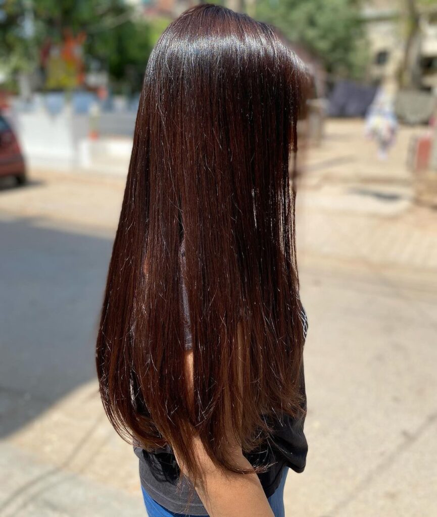 Wet-look, glossy dark brown hair