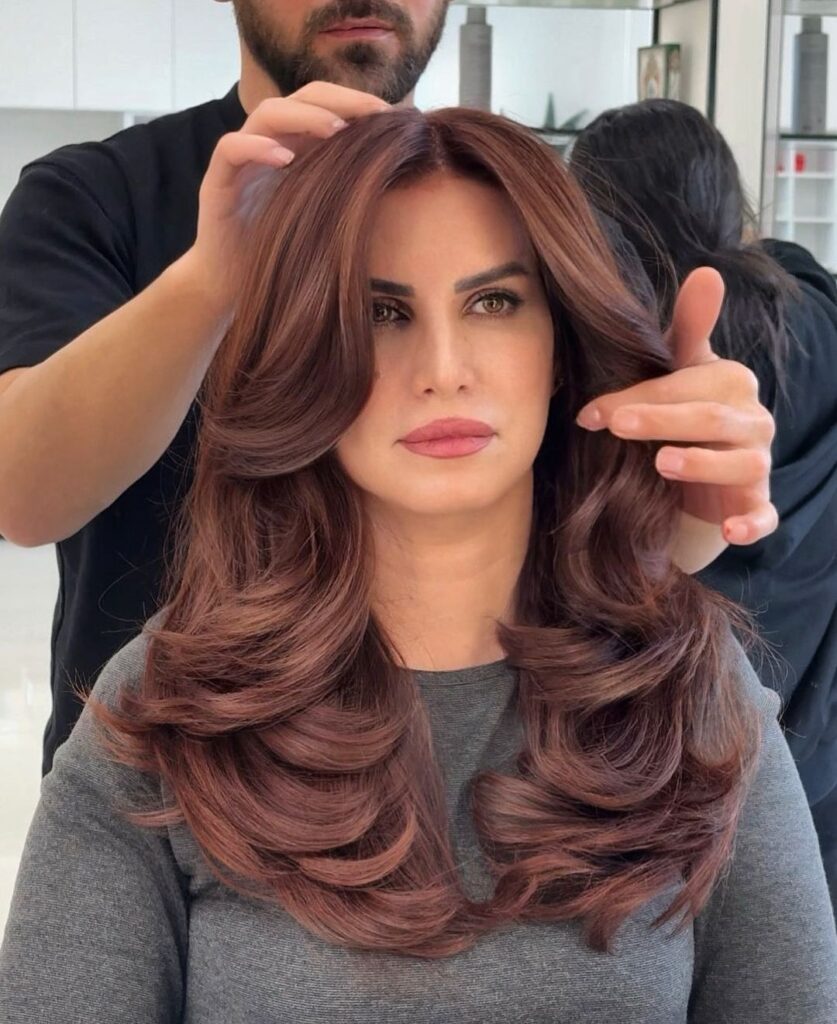 Medium-length hair with textured butterfly layers