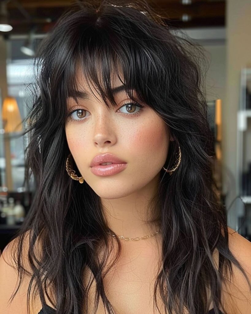 Medium-length layered hair with voluminous bangs