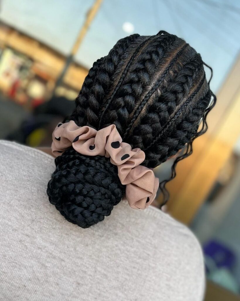 Classic low bun with box braids