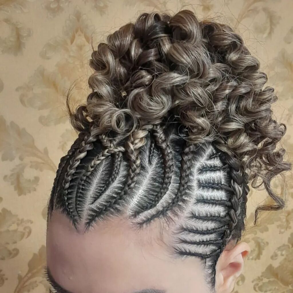 Box braids partially styled into bun