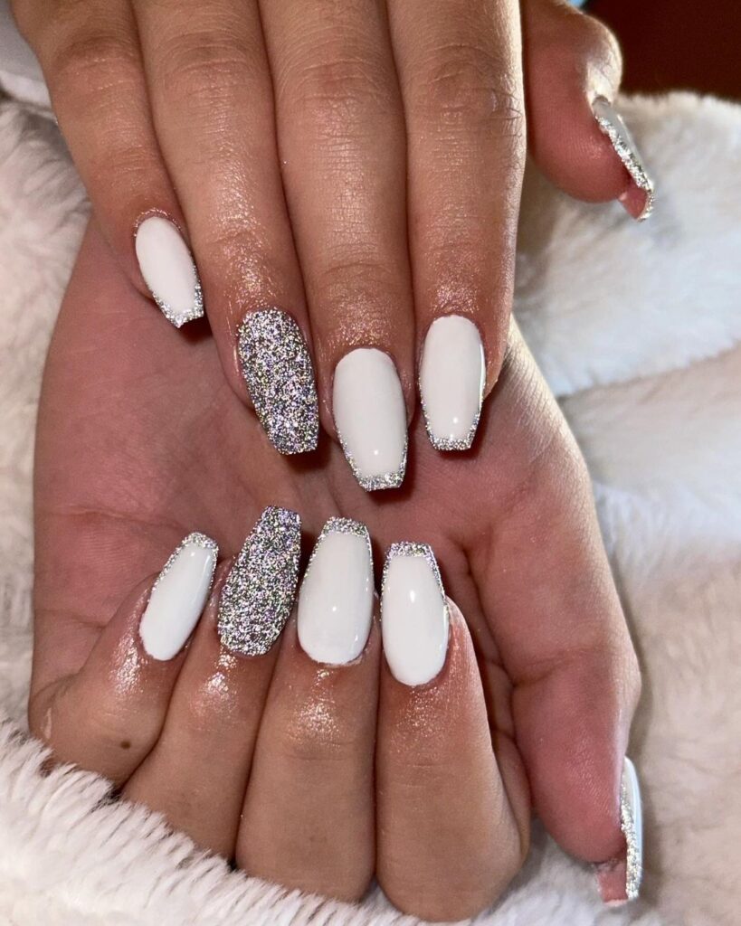 Short white nails with sparkling glitter