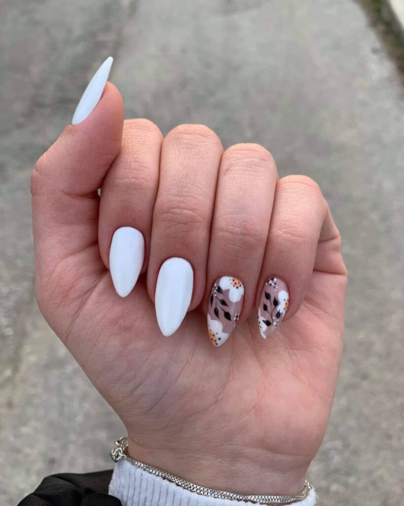 Short white nails with pointed stiletto tips