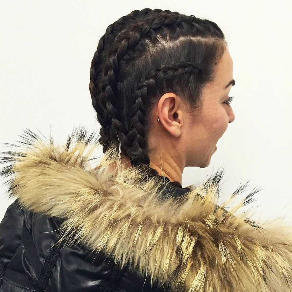 Multiple cornrow braids, shaved side, spring-edgy