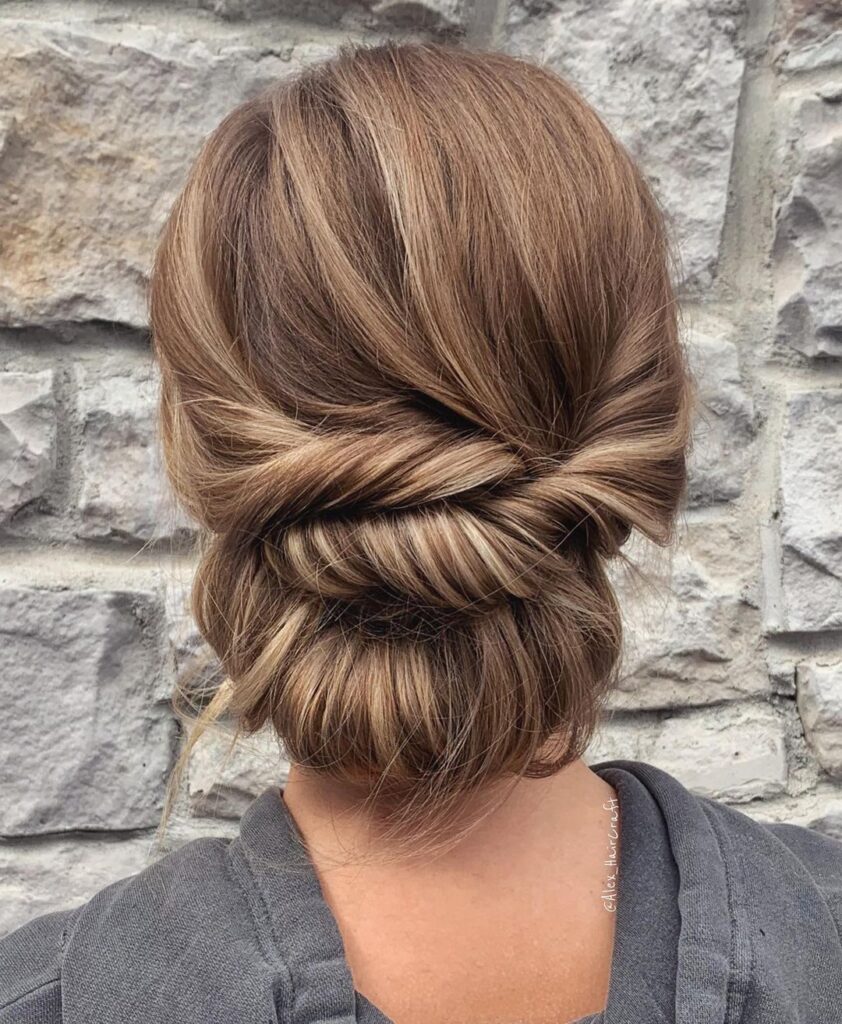 Twisted low bun with highlighted hair