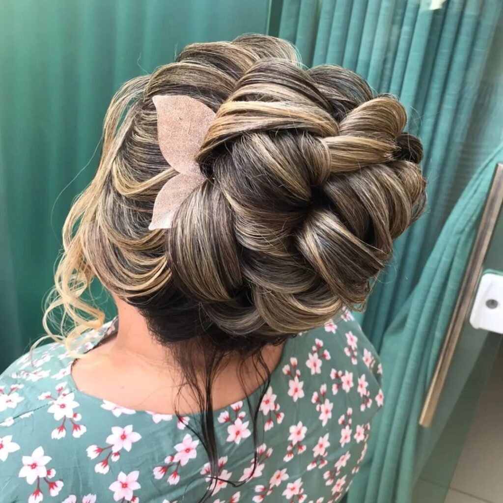 Twisted floral updo with pink accessory