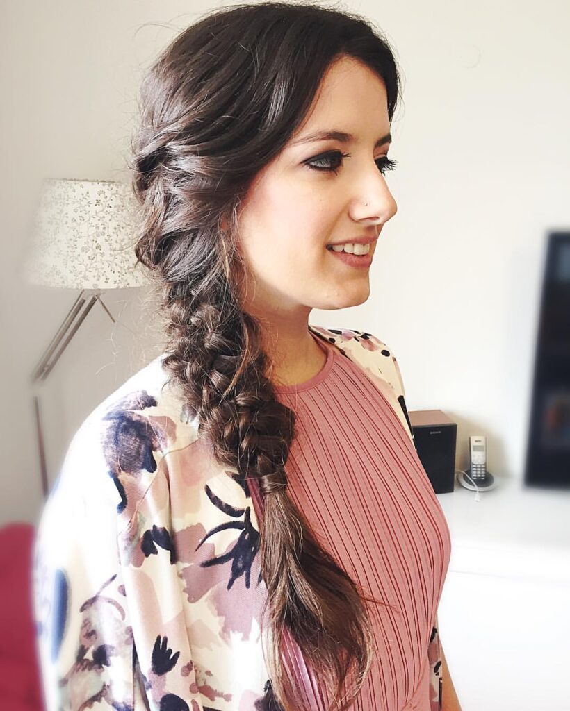 Loose side braid, wavy texture, spring-inspired