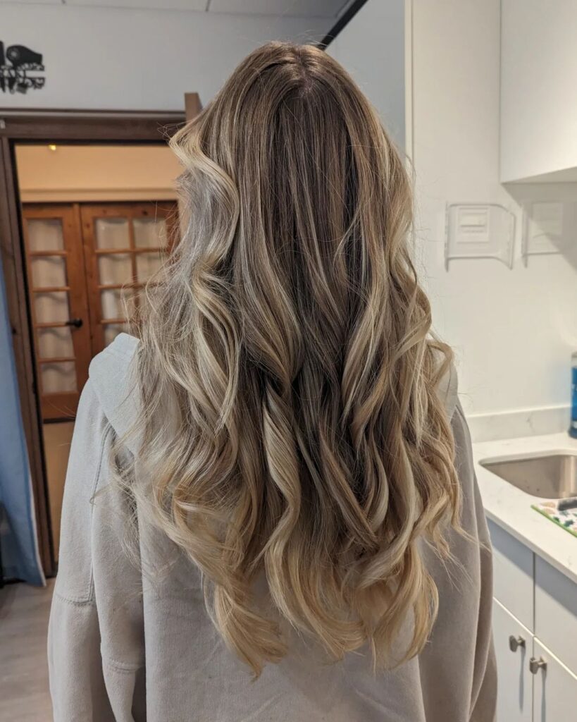 Balayage waves, root fade, sun-kissed spring hair