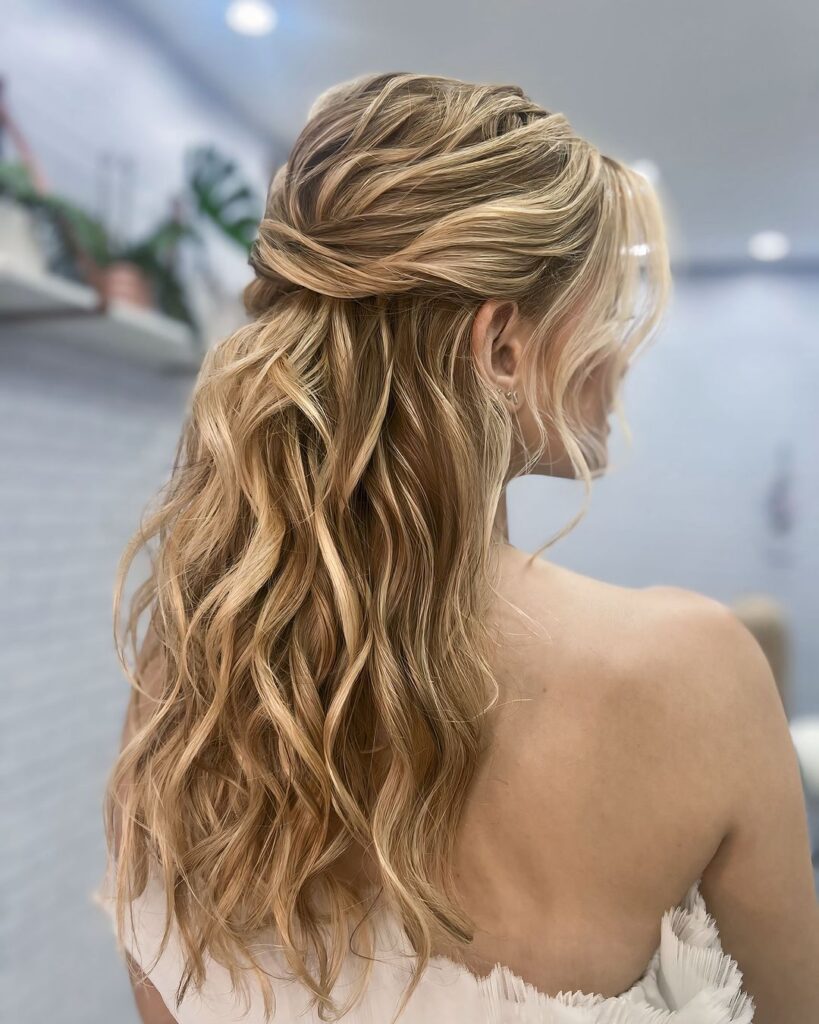 Twisted half-up, cascading waves, spring elegance