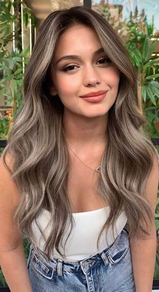 Cool ash brown tones create a sophisticated style.