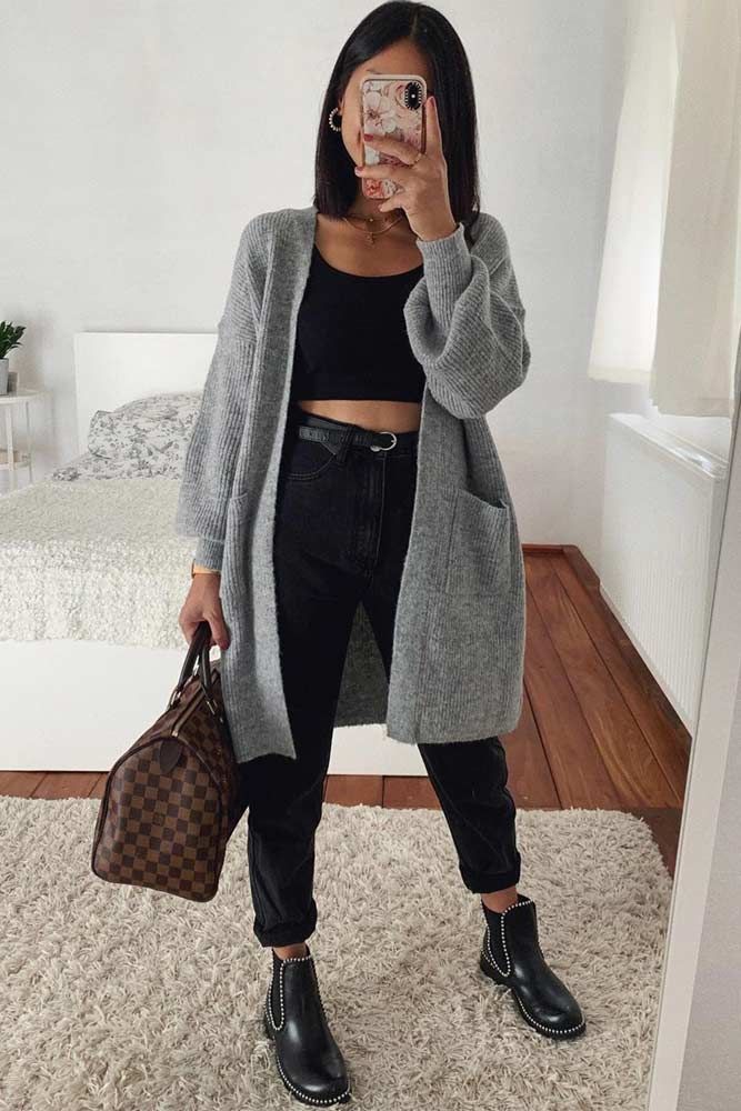 "Cozy cardigan paired with high-waisted jeans for a classic look."