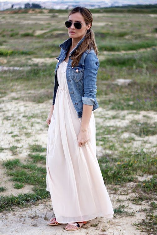 "Timeless denim jacket layered over a maxi dress for a relaxed look."
