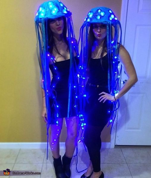 "Futuristic LED mermaid costume for a glowing appearance."
