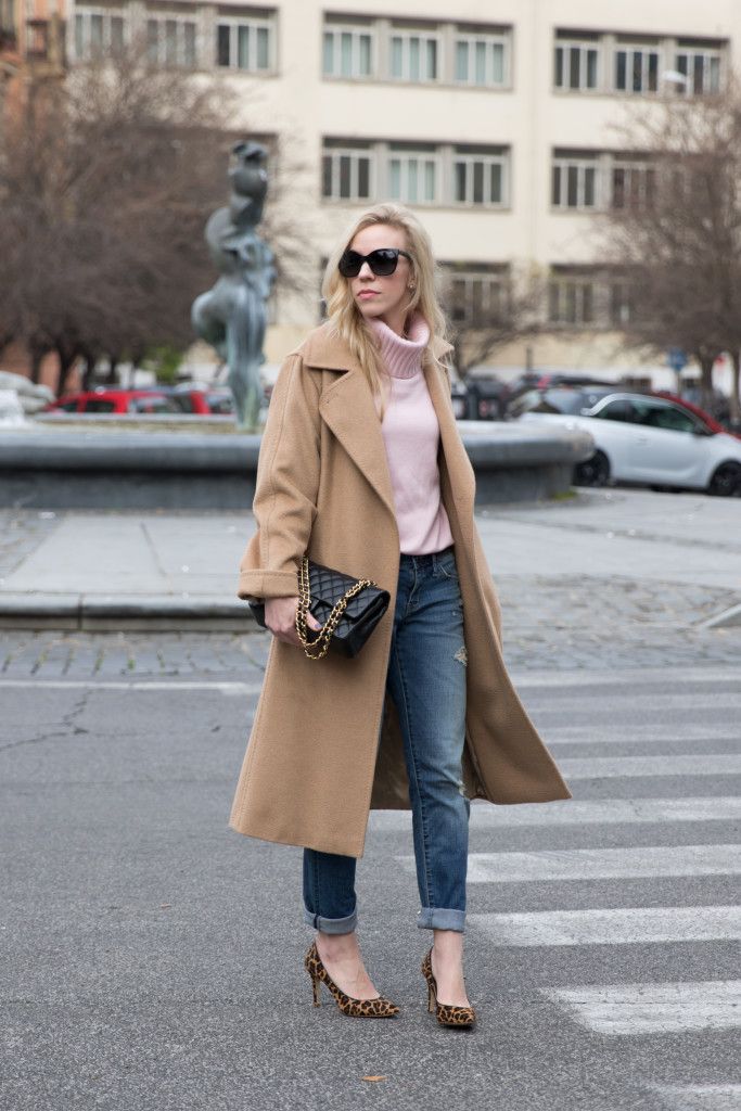 "Timeless lightweight trench coats over classic jeans for chic layers."