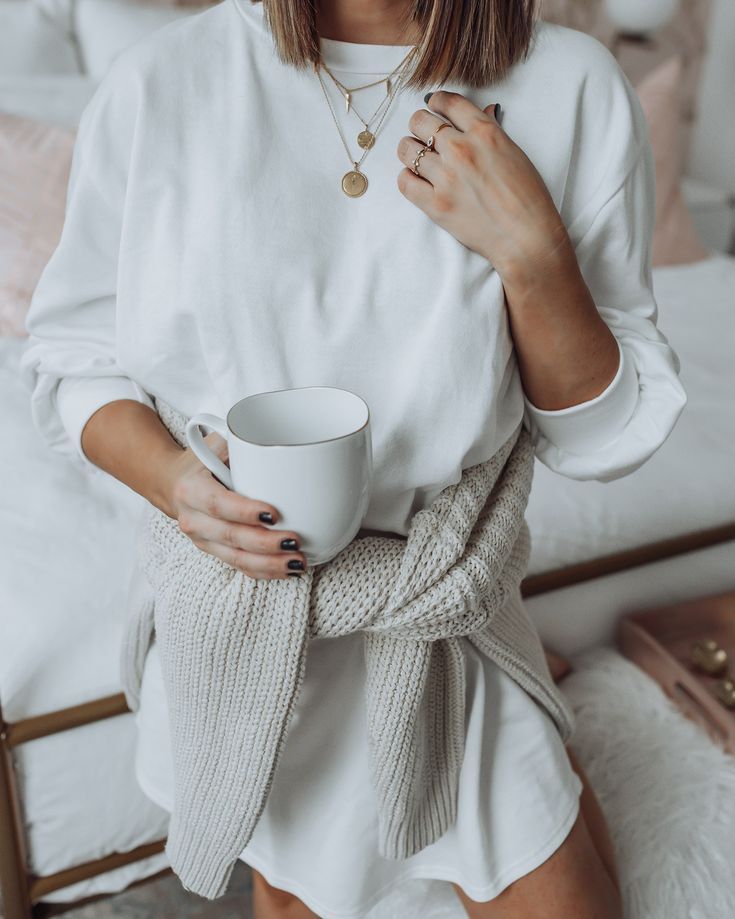 "Casual long-sleeve tees accessorized with layered necklaces for a chic touch."