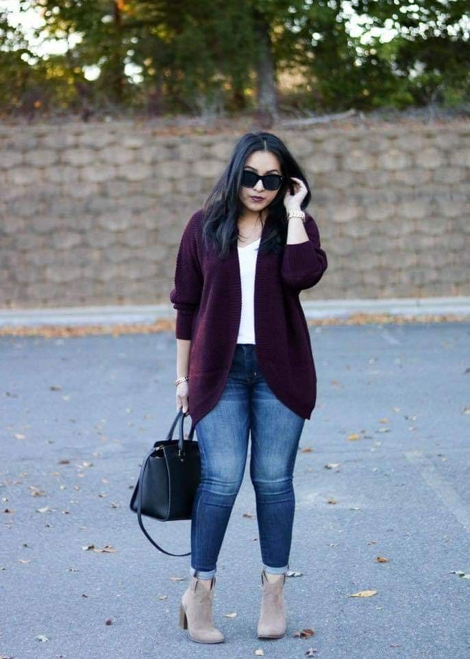 Casual maroon cardigan with light jeans.