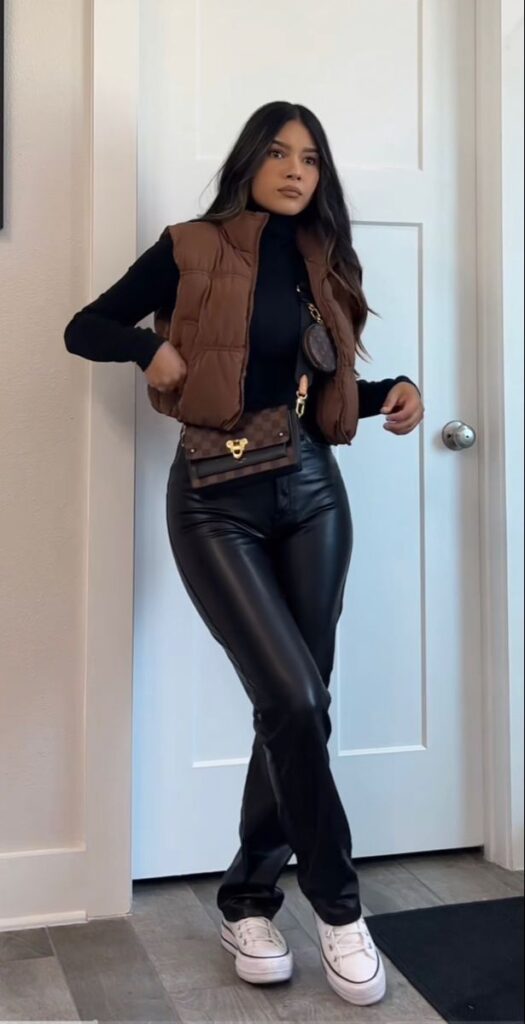 "Cozy puffer vest over a long sleeve tee for warm layering on chilly days."