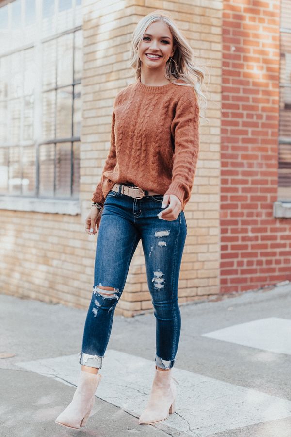 Cozy rustic vibe with cable-knit sweaters.