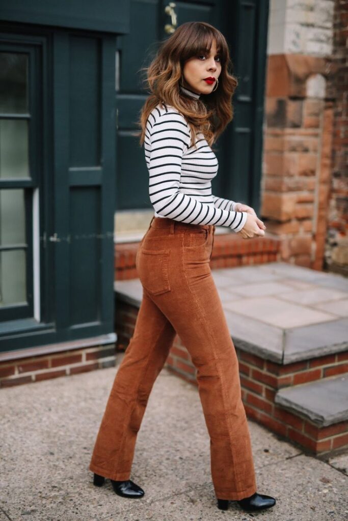 "Trendy striped sweaters matched with corduroy pants for a chic autumn."