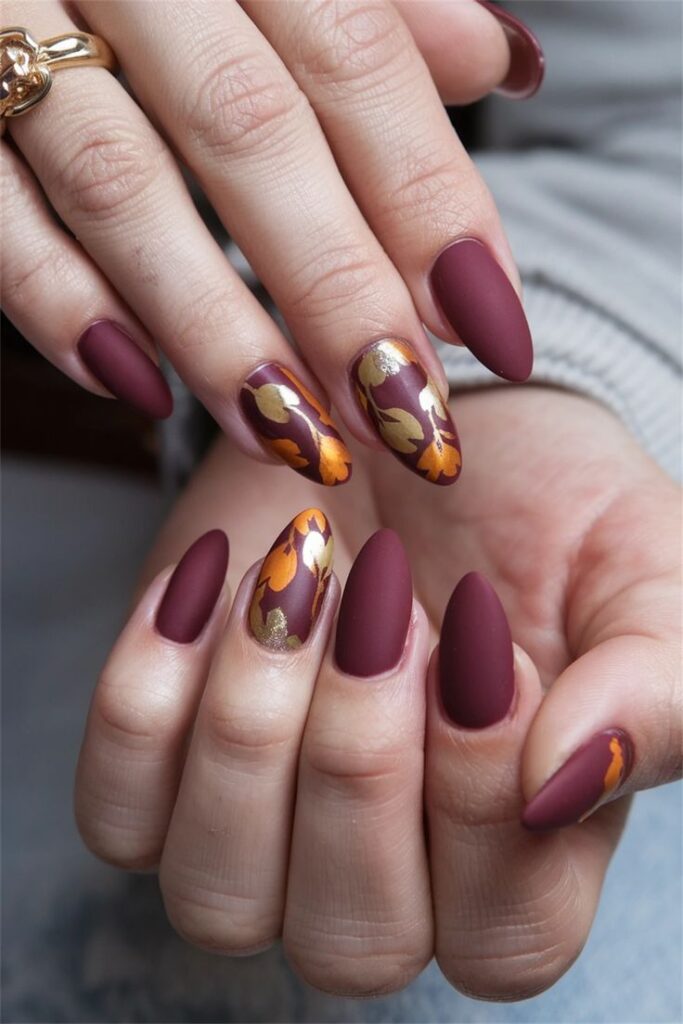 Almond nails with fall landscape designs
