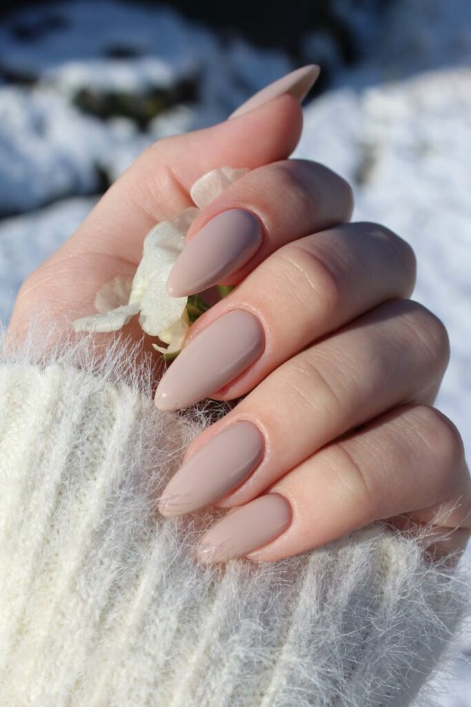 Creamy beige almond nails, minimalist style
